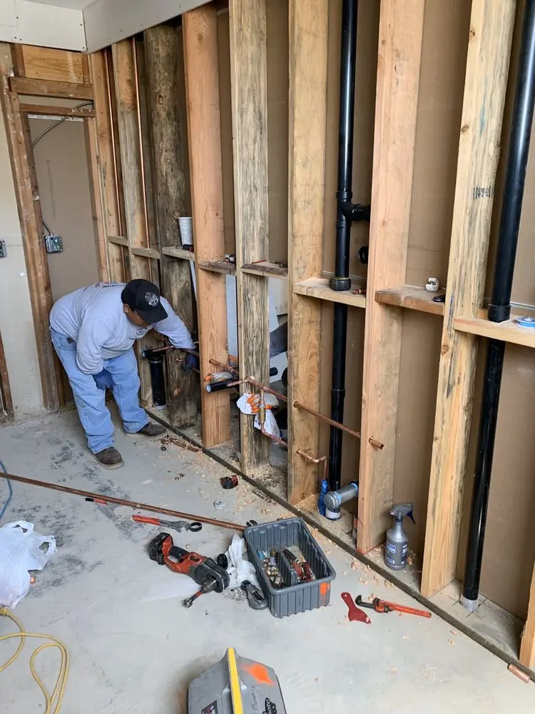 Commercial rough-in plumbing for Water Heater Replacement in Creek Crossing Estates